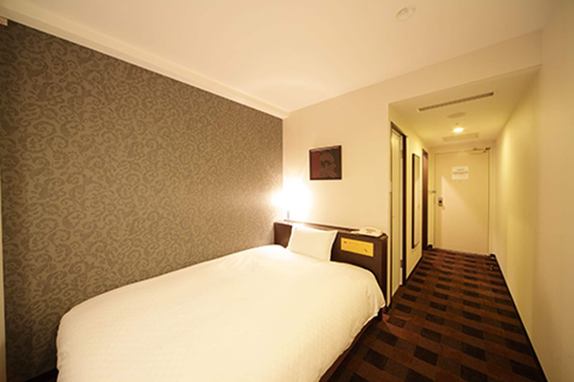 Hotel Granvia Wakayama Esterno foto A single room at a hotel in Japan