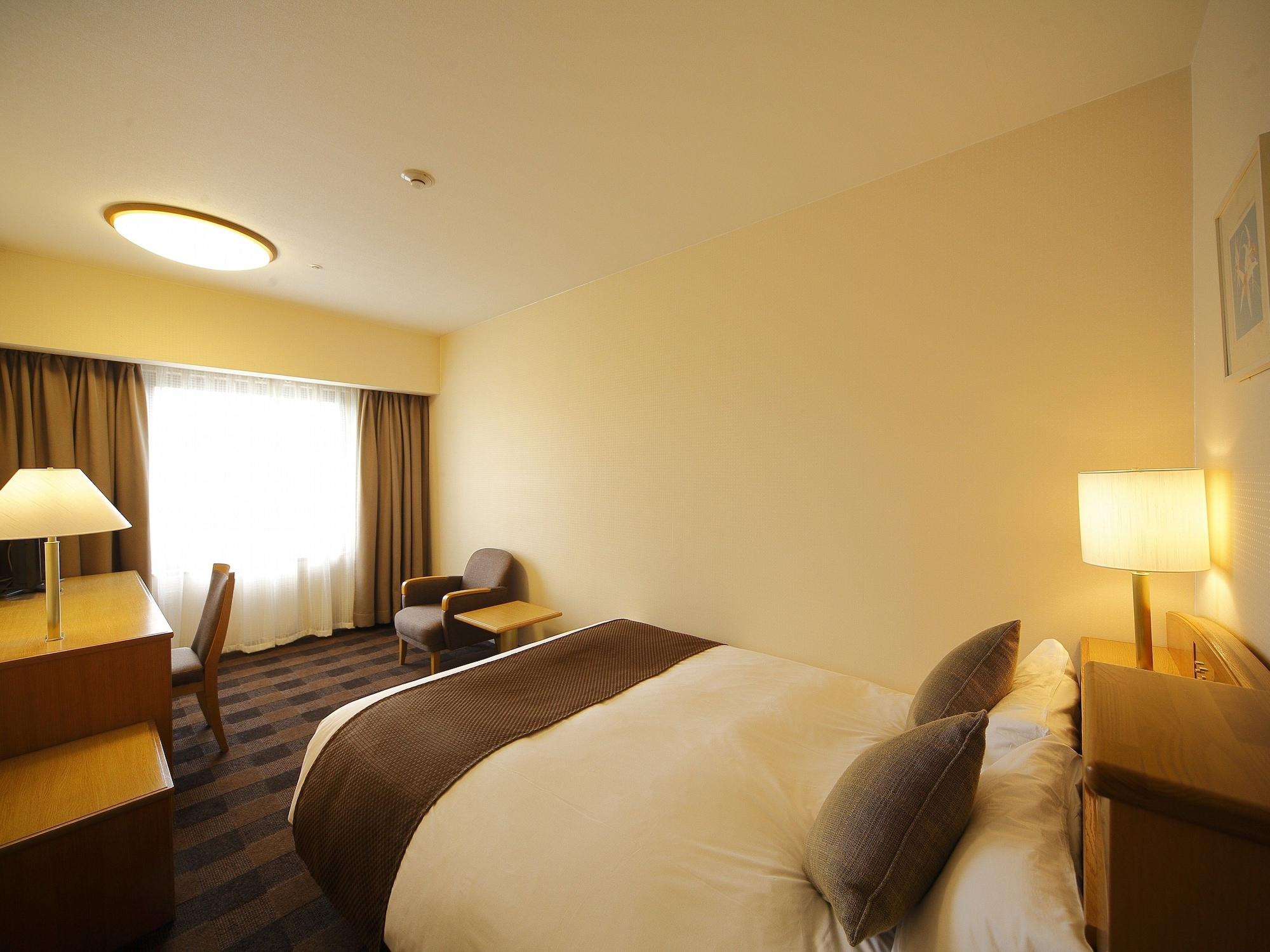 Hotel Granvia Wakayama Esterno foto A room at the hotel