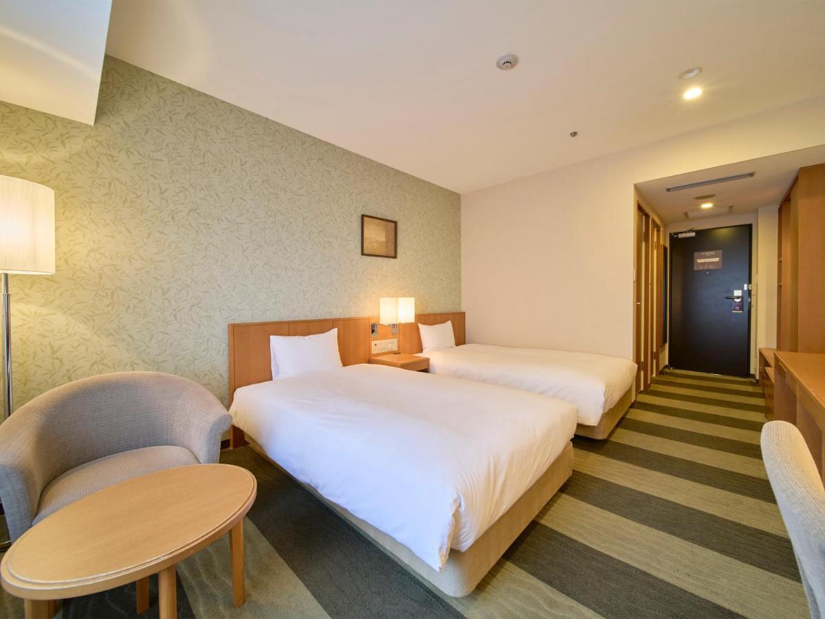 Hotel Granvia Wakayama Esterno foto A room at the hotel