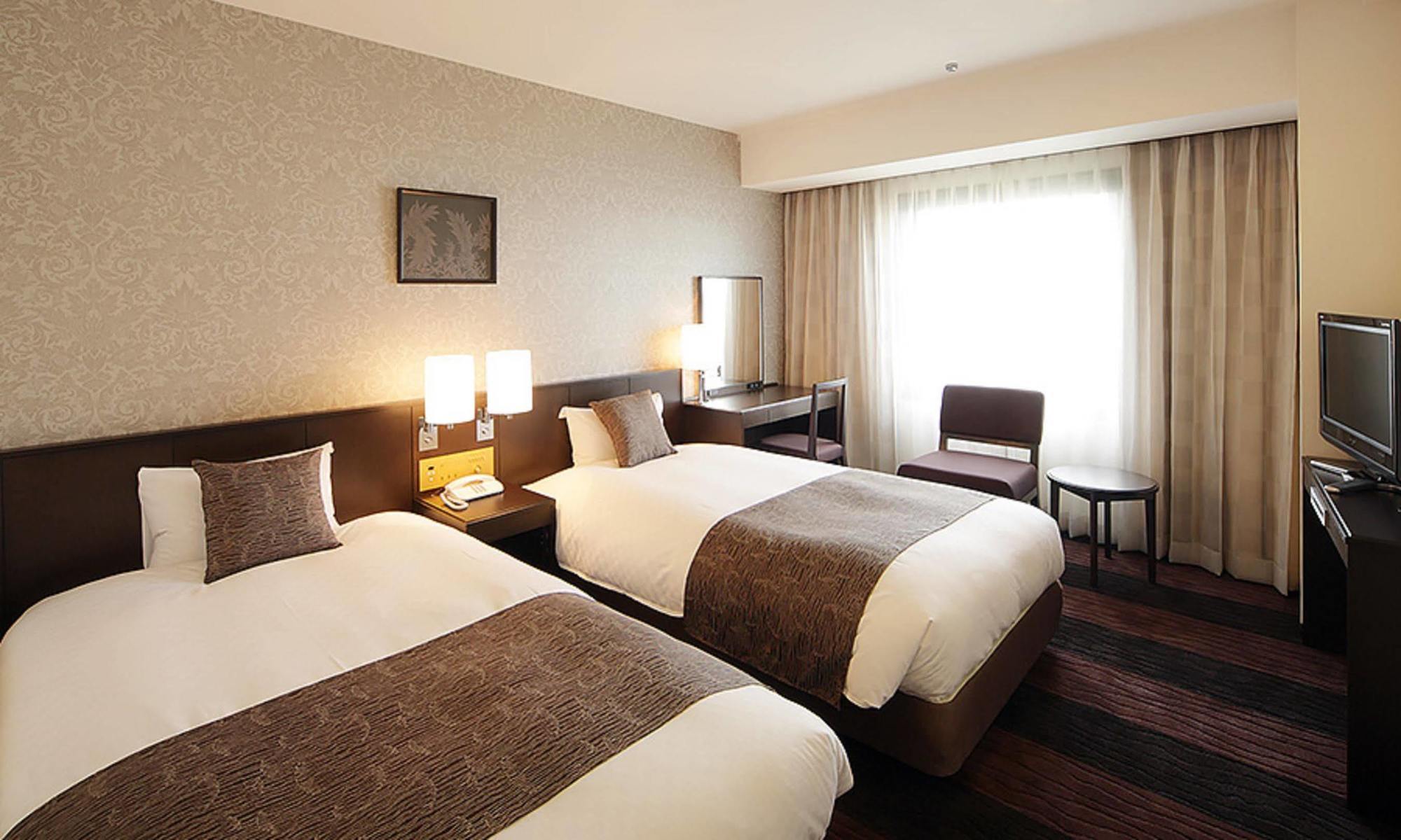 Hotel Granvia Wakayama Esterno foto A room at the hotel