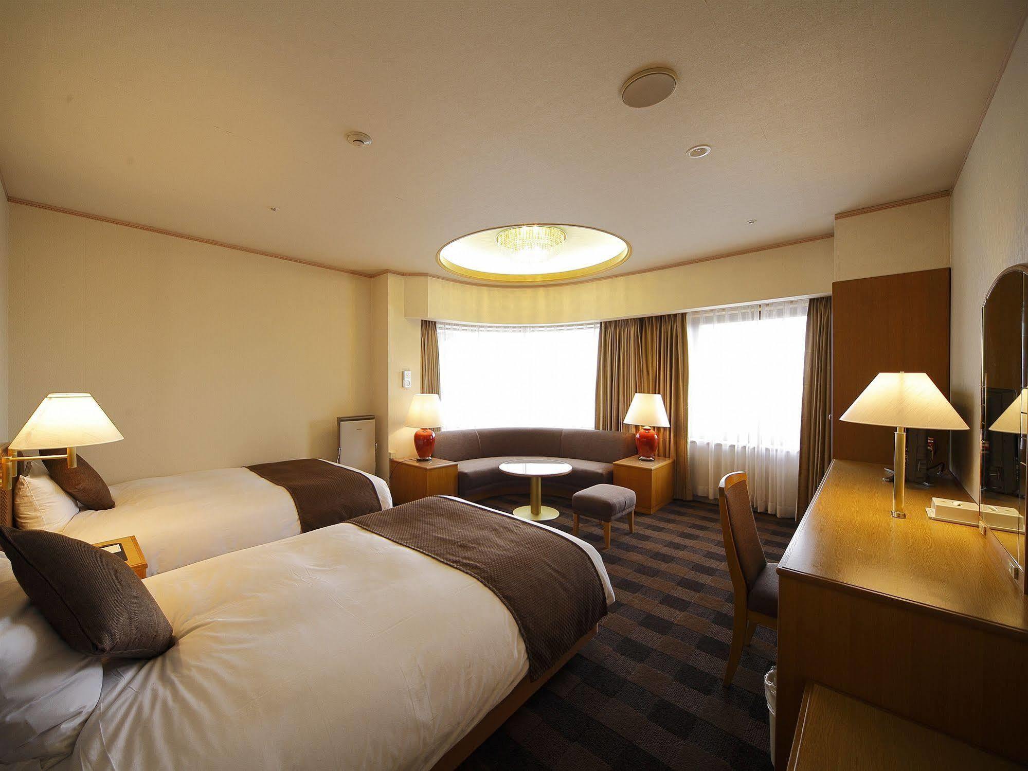 Hotel Granvia Wakayama Esterno foto A room at the hotel